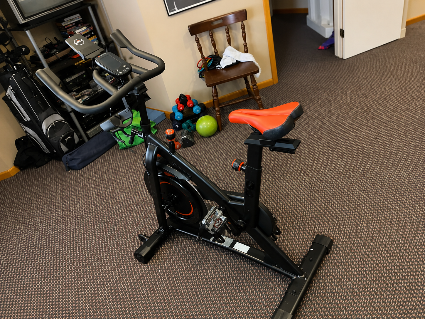 Indoor exercise bike set up in a home workout space