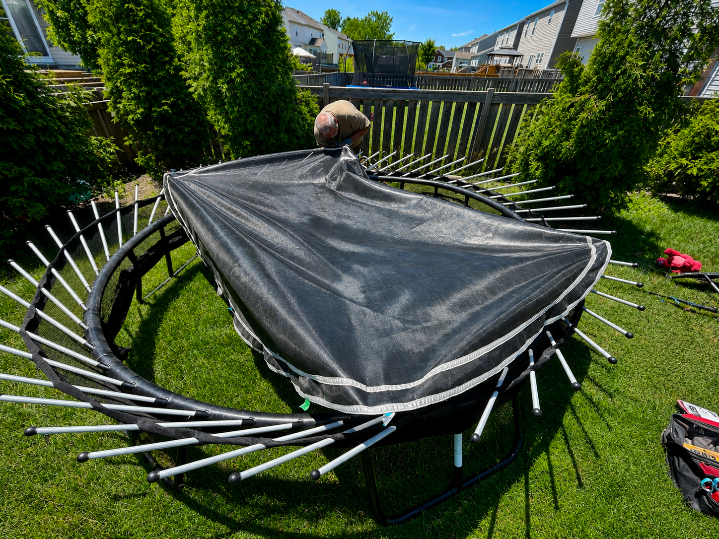 Trampoline assembly, safety-net reinstall, spring replacement, relocation, and haul-away service in Central Ohio.